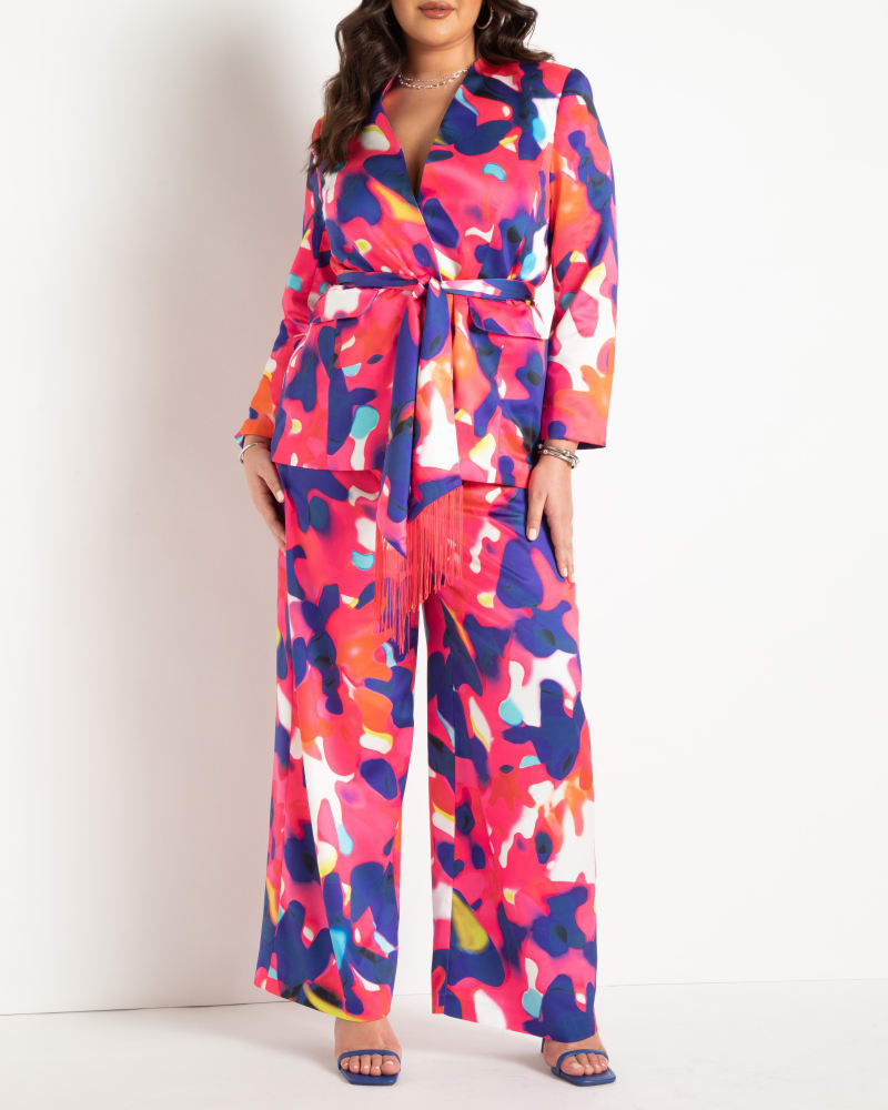 Front of a model wearing a size 18 Printed Wide Leg Pant in Color Drip by ELOQUII. | dia_product_style_image_id:292791